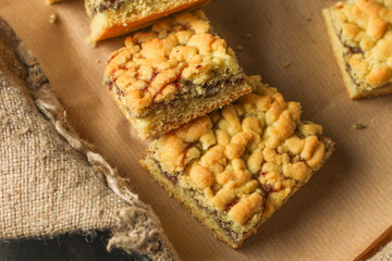 cake with Streusel, jam and crunch. top view. food background