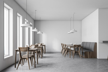 White cafe interior with sofa