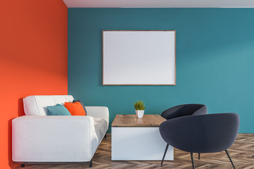 Orange and blue living room with poster