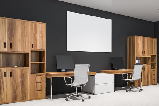 Gray modern office with poster on wall