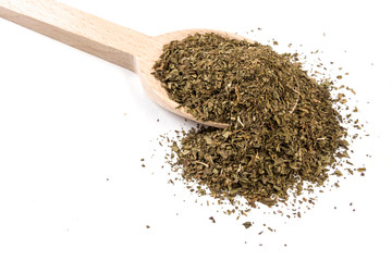 mint leaves on wooden spoon on white background