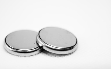 two batteries in black and white