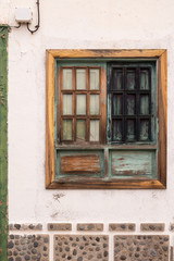 Fototapeta na wymiar Window with a green frame, Tenerife