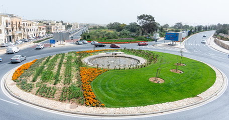 Fototapeta premium Flowers arrangement and roundabouts 