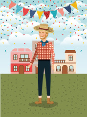 young farmer celebrating with garlands and cityscape