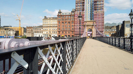 Portland Street Suspension Bridge, pedestrian crossing, over the River Clyde near Glasgow city centre.