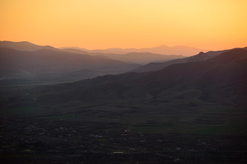 Naklejka na ściany i meble Fabulous sunset with mountains, Armenia