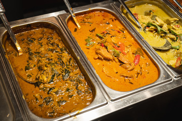 Thai curry in soup station at buffet restaurant