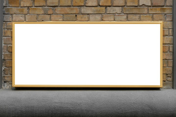 Obraz premium Blank horizontal billboard on brick wall for your advertisement. white billboard mock-up on brick wall with space for text.