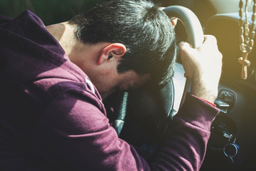 sad man in car