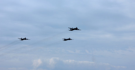 Fototapeta na wymiar Military cargo planes flying in the sky in St. Petersburg, Russia 