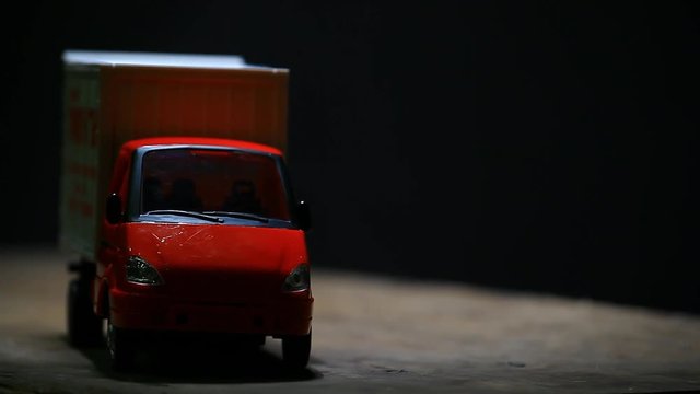 red toy car wooden background hd footage 