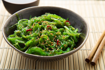 Wakame seaweed salad with sesame and chili pepper © asife