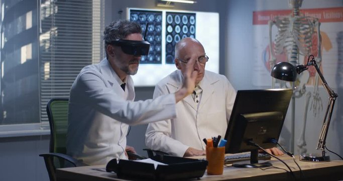 Doctors Watching Screen Using Virtual Reality Headset