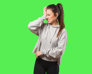 Young fitness woman forgetful, realize something