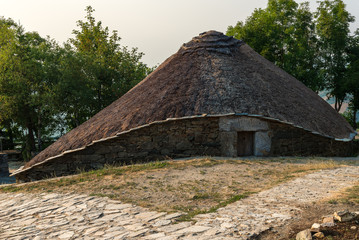 Palloza, traditional thatched roof house in O Cebreiro, Lugo, Spain