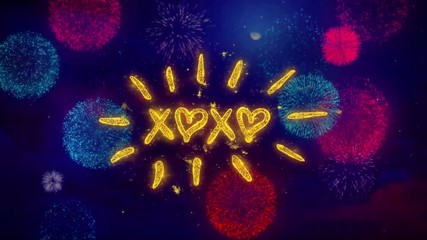 XOXO Valentine's Day Greeting Text with Particles and Sparks Colored Bokeh Fireworks Display 4K. for Greeting card, Celebration, Party Invitation, calendar, Gift, Events, Message, Holiday, Wishes .