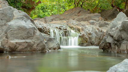 Fototapeta na wymiar small waterfall