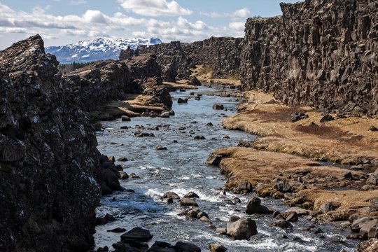Almannagja breaking point of the North American and Eurasian tectonic plates in the river Oxara, Thingvellir National Park, Golden Circle, Iceland, Europe