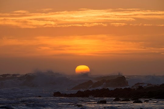 Stormy Mediterranean Sea at sunset on the coast of Capo Pecora, Buggerru, Sardinia, Italy, Europe