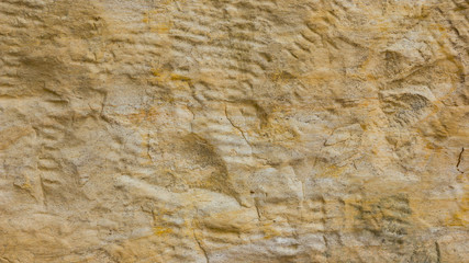 Background of the old wall. Texture of stone surface. Abstract background in retro style. Brown surface of solid material