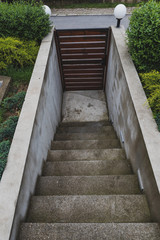 concrete steps and wooden gate