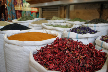 Bags of tea and spices (in the foreground karkade) in the Moroccan market