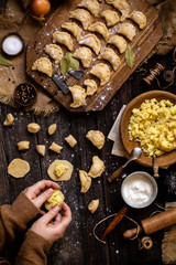 Overhead shot process of making homemade dumplings with potato