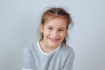 Little child girl posing at studio.Perfect emotional portrait fashion kid. Beautiful face caucasian child 6-7 years