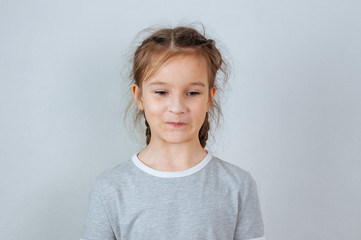 Little child girl posing at studio.Perfect emotional portrait fashion kid. Beautiful face caucasian child 6-7 years