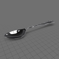 Decorated metal spoon