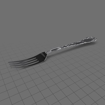 Decorated metal fork