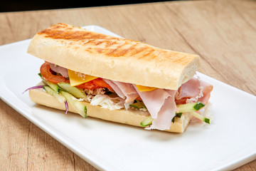 sandwich with ham and vegetables