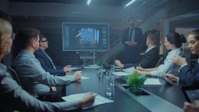Late at Night in Startup Meeting Room: Chief Engineer Talks Uses Digital Whiteboard to Present New Neural Network, AI, Data Mining Solution to a Board of Directors, Investors and Venture Capitalists