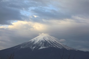 Stormy cloudscape over the peak of Mt. Fuji Japan horizontal background
