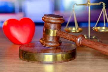Justice Gavel and stethoscope with red heart on background.law concept Judge law medical Pharmacy compliance Health care business rules. 