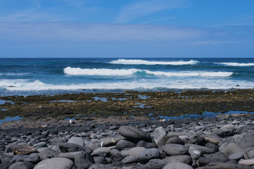 Fototapeta na wymiar waves at the beach of El Golfo, Lanzarote