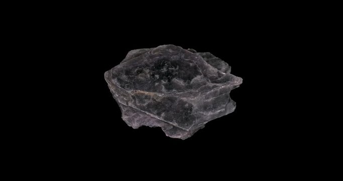 Lepidolite Mineral Turning on Black