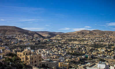 ghetto city street district Middle East third world poor inhabit dry desert environment 