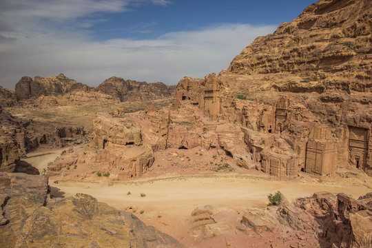 world famous heritage site Petra ancient city in Middle East Jordanian country territory, sand stone rocks nature scenic landscape and old building carved in mountain, tourism and sightseeing concept