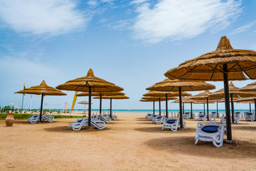 Straw umbrellas on the beach