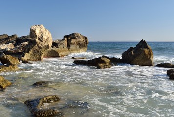 Fototapeta na wymiar Stone beach Salines on Ibiza. Balearic Islands. Spain