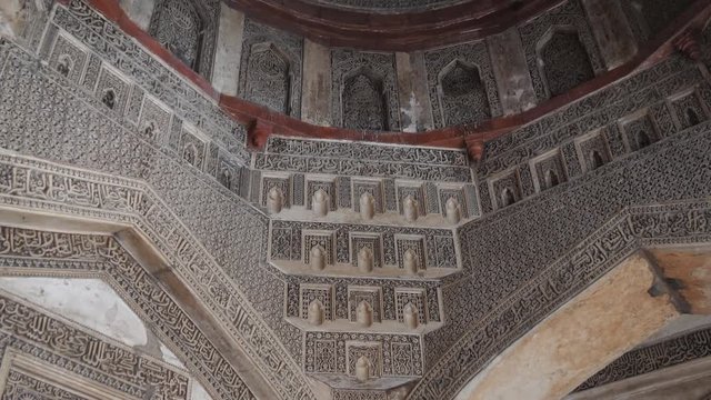a tilt down shot of the interior of bara gumbad at lodi gardens in delhi, delhi- 4K 60p