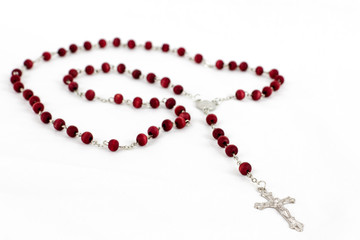 red beads on white background