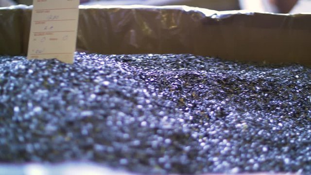 A large pile of tiny metal pieces with label