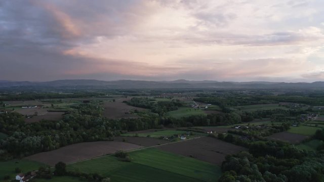 Very rear moment to capture sunset after rain and storm in Bosnia and Herzegovina, Brcko district. Beautiful land with stunning flat land and mountains in distance.Filming in 4k with Mavic2pro d-log