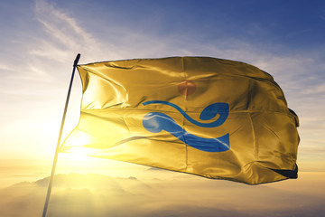 South Jeolla province of South Korea flag waving on the top sunrise mist fog