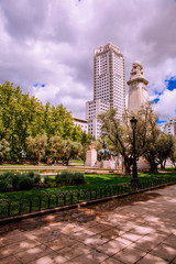 Naklejka premium “Plaza de España” Madrid. View of the Cervantes monument and the Spain Building “Edificio Espana” on the Square of Spain “Plaza de Espana”. Madrid, Spain. Picture taken – 26 April 2019.