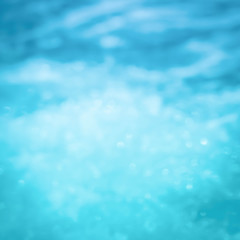 Blur beautiful beach summer holiday background blur with white wave bubbles