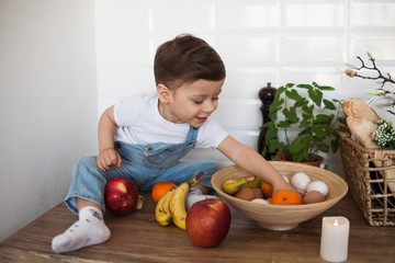 Fototapeta premium Kid having a table full of organic food. 